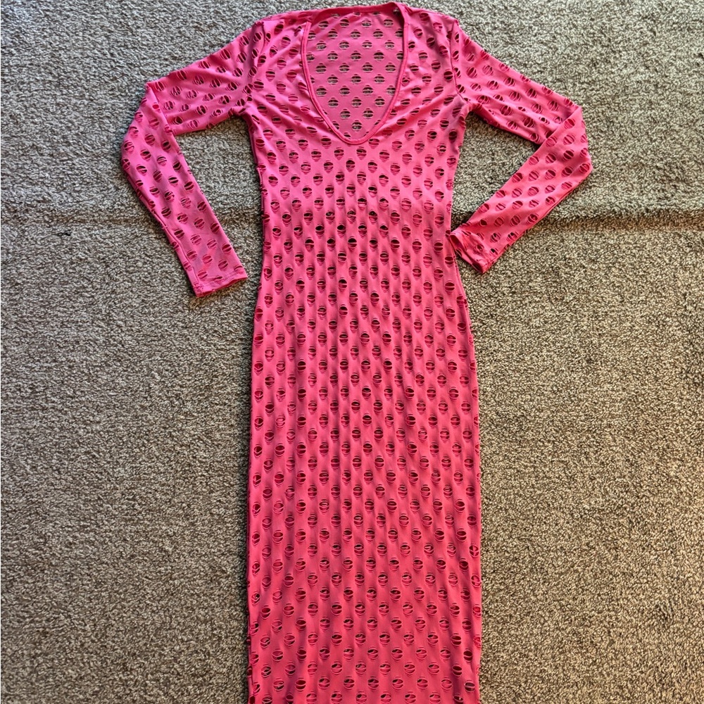 Pink see through dress.